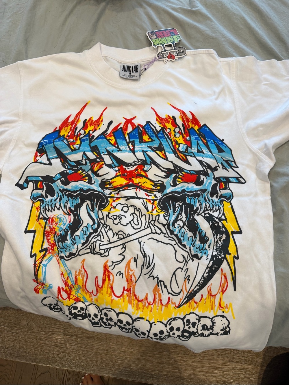 Men's White Graphic Tee with Blue & Yellow Skull Design